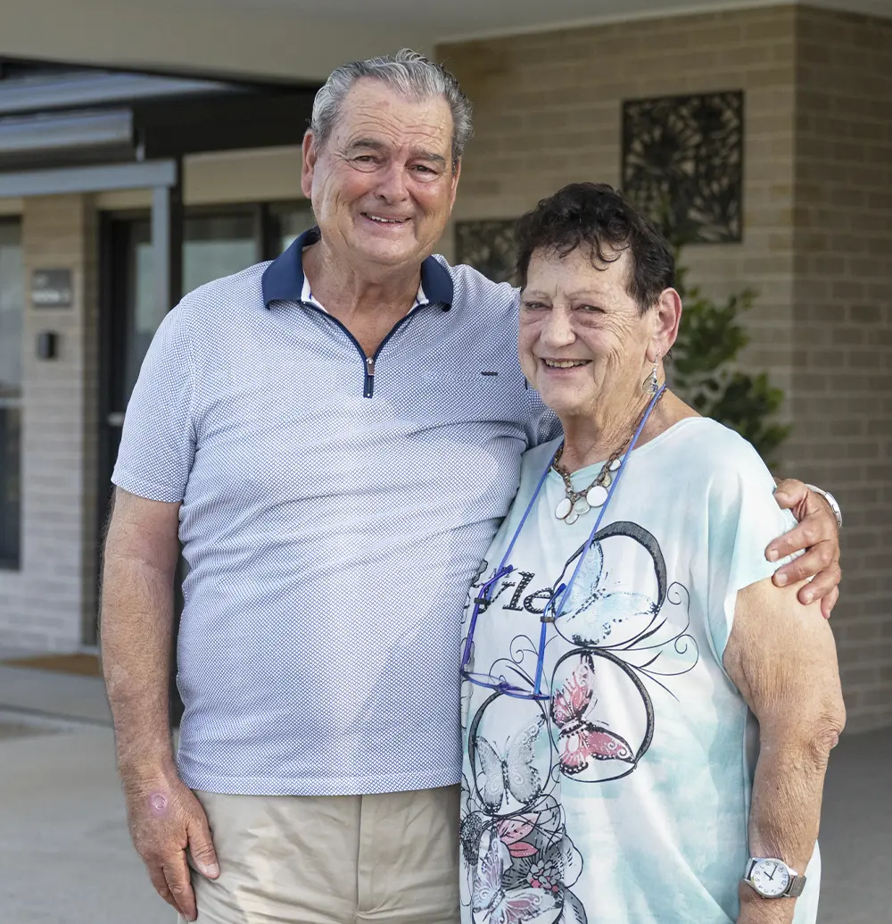 Brian and Sylvia Scattergood in front of their kit home